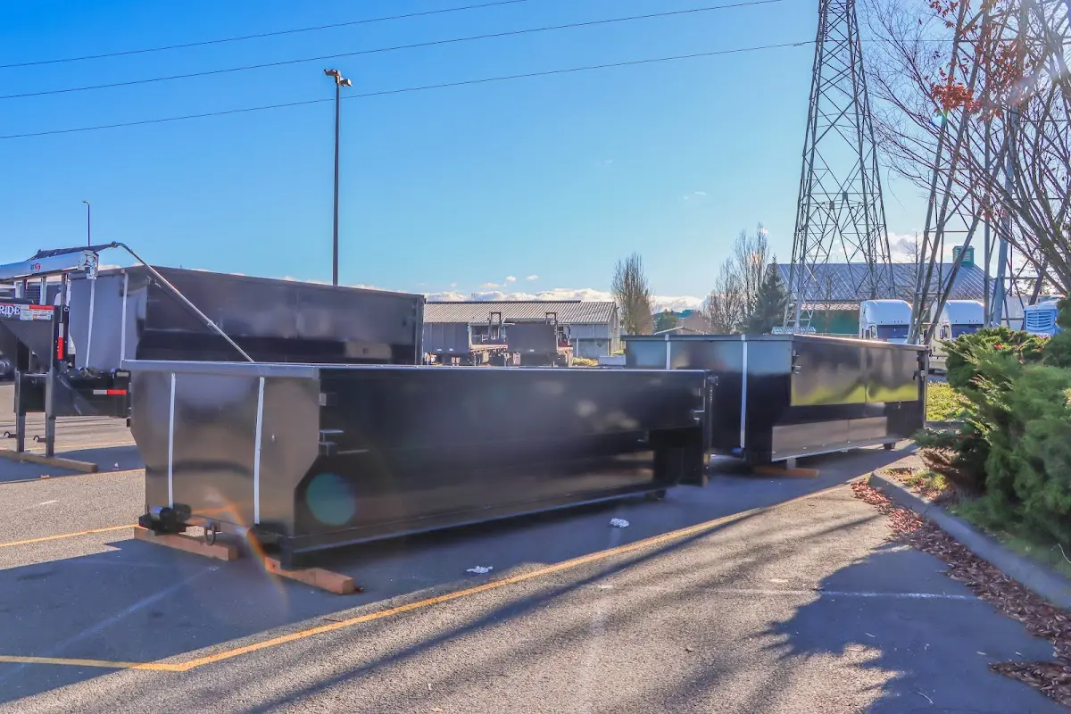 Roll-off dumpster ready for waste disposal at job site for 15 Yard Dumpster Rental in Midway